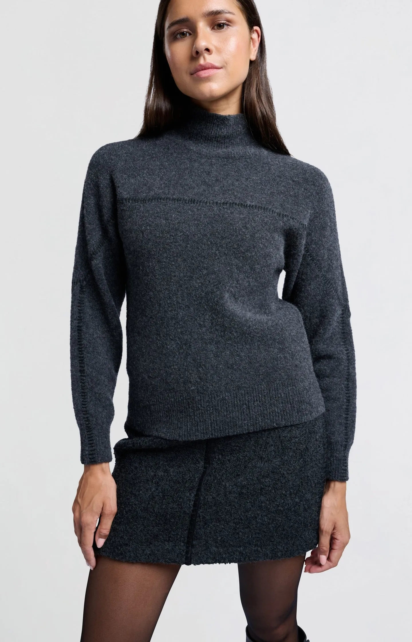 Dark mini skirt in wool mix with seam detail